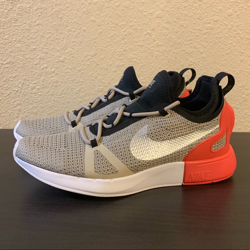 Women’s Nike Duel Racer Sz 9